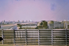 Look at all those planes surrounded by barbed wire